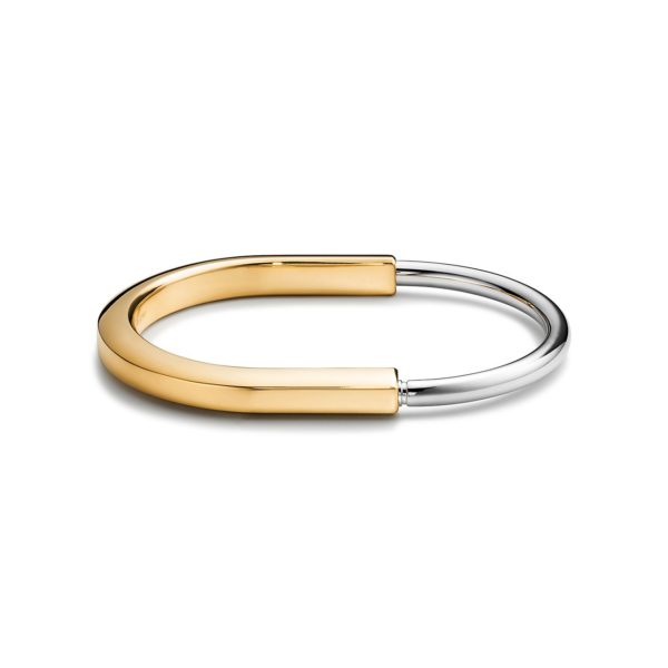 Bracelet jonc Tiffany Lock en or jaune et or blanc 18 carats – Size Small Tiffany & Co.