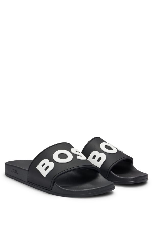Hugo Boss Mules confectionnées en Italie avec logo en relief