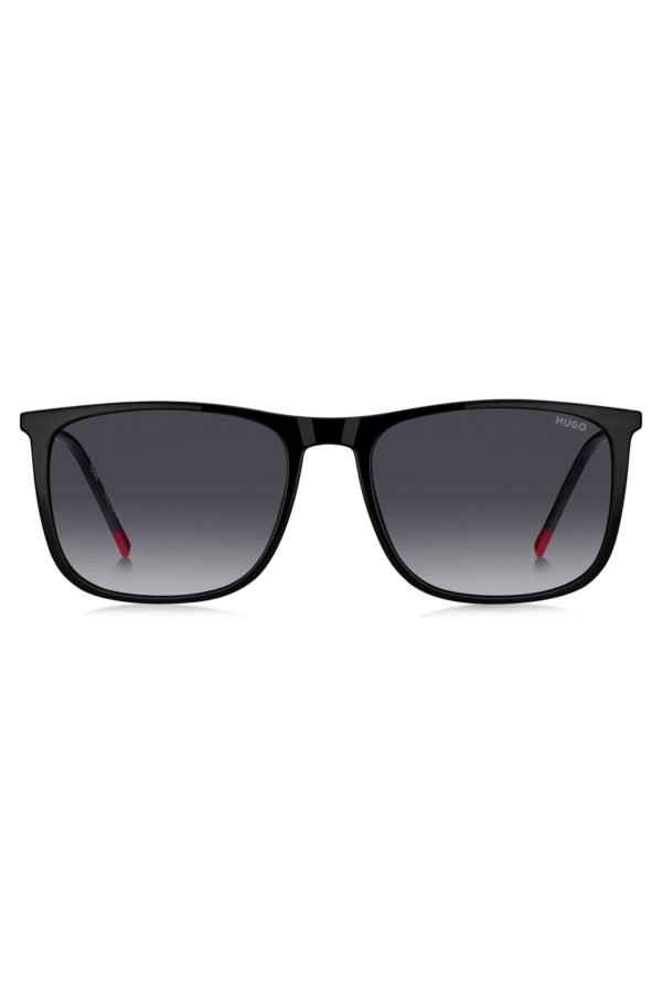 Hugo Boss Lunettes de soleil noires avec détails rouges emblématiques