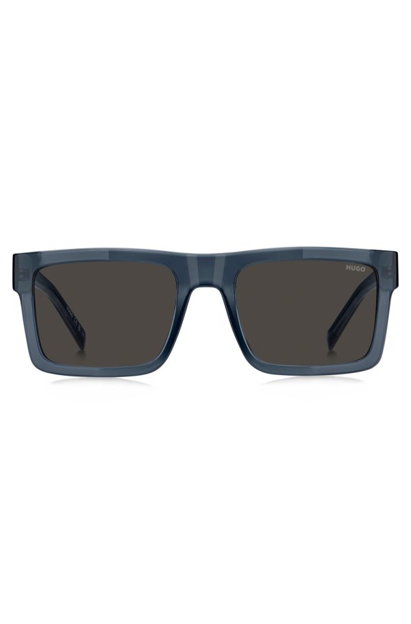 Hugo Boss Lunettes de soleil teinte bleue transparente avec verres gris