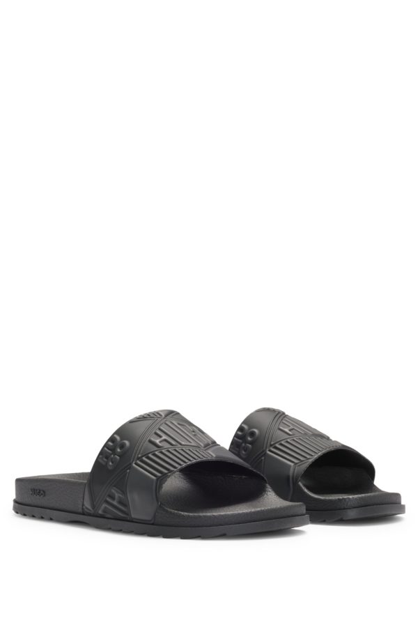 Hugo Boss Mules confectionnées en Italie avec logos mélangés