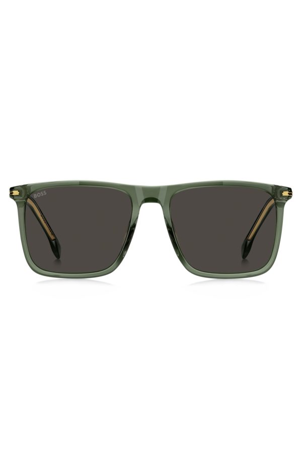 Hugo Boss Lunettes de soleil en acétate vert avec finitions dorées